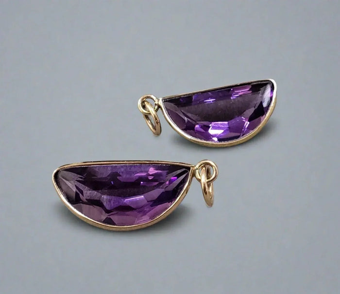 Faceted amethyst gemstone pendants in gold setting, elegant jewelry accessories