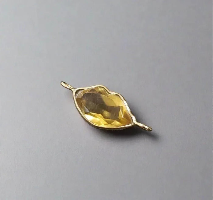 Elegant gold pendant with faceted citrine gemstone, luxury jewelry accessory
