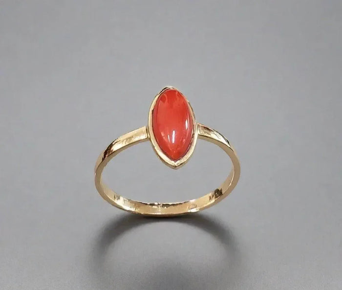 Elegant gold ring with oval coral gemstone, fine jewelry for women