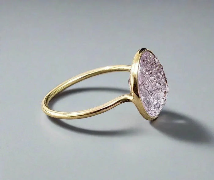 Elegant gold ring with pink druzy gemstone, perfect for sophisticated jewelry lovers