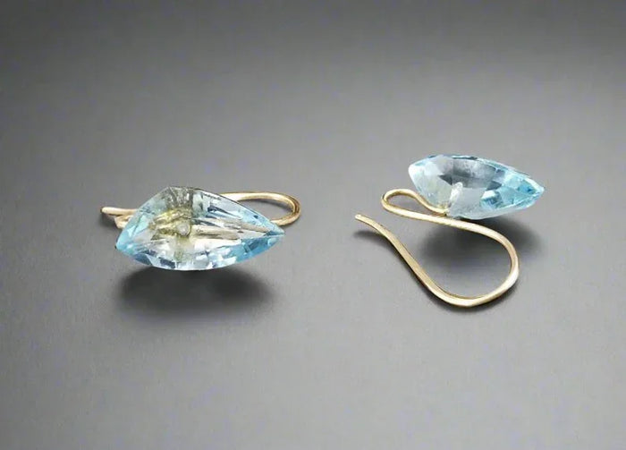 14k Gold Sky Blue Topaz Earrings: Dainty Birthstone Studs