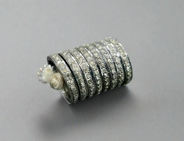 Elegant diamond-studded stackable rings in silver, perfect for luxury jewelry collections