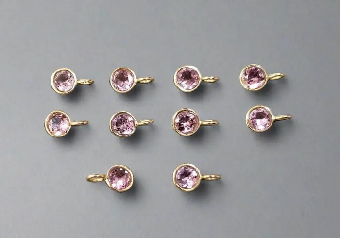 Pink gemstone gold charms for elegant jewelry making, perfect for necklaces or bracelets