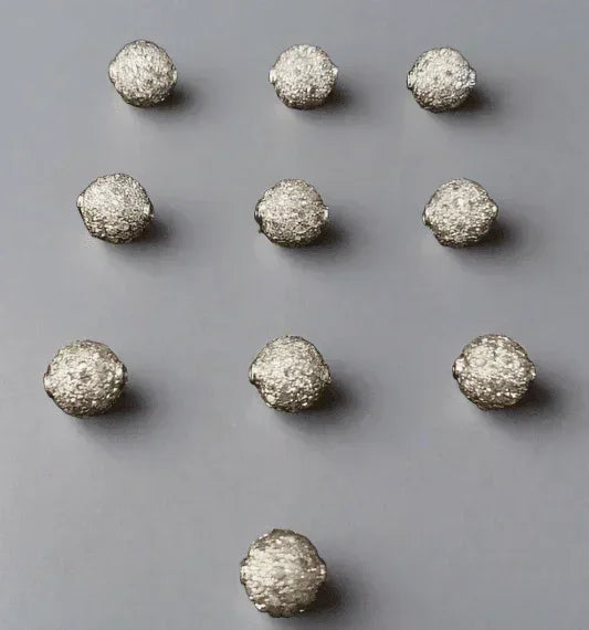 Sparkling textured silver beads for elegant jewelry designs