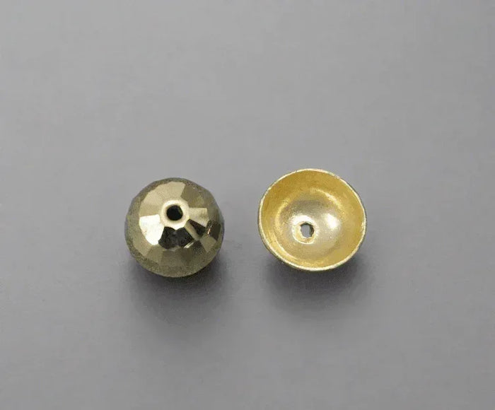 Faceted gold bead and open-back setting for elegant jewelry designs