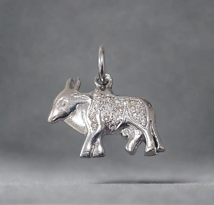 Silver bull charm with textured detailing, elegant jewelry accessory for necklaces or bracelets