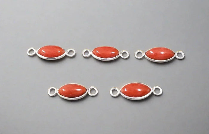 Five silver connectors with oval coral stones for jewelry making