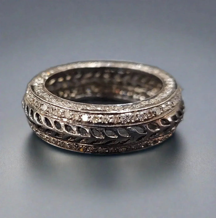 Elegant diamond-encrusted filigree ring with intricate detailing, perfect for luxury jewelry lovers