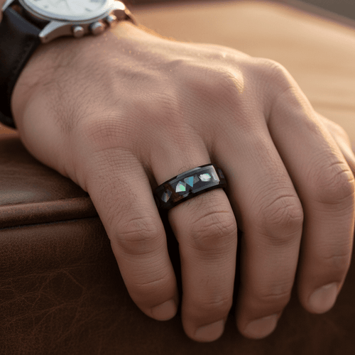 ABALONX — Lifestyle photo on hand — men's tungsten wedding ring.