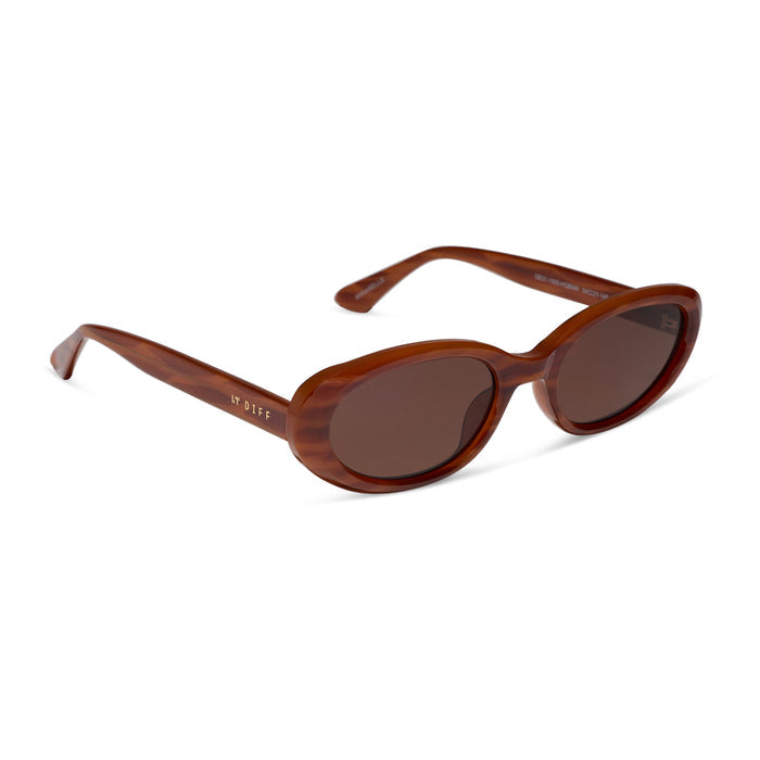 diff eyewear featuring the annabelle round sunglasses with a harvest tortoise frame and brown lenses angled view
