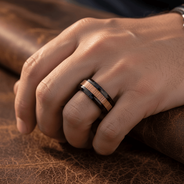 BAMBOOZLE — Lifestyle photo on hand — men's tungsten wedding ring.