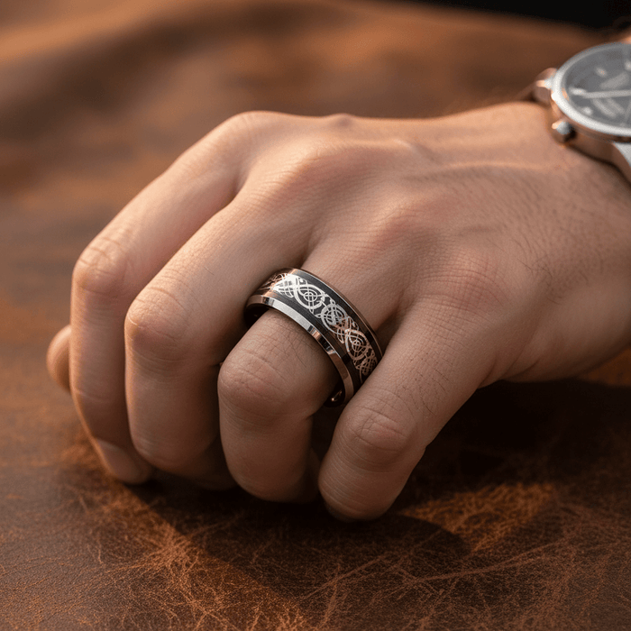 BETTLER — Lifestyle photo on hand — men's tungsten wedding ring.