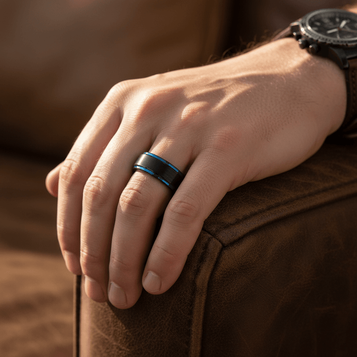 BLIGHT — Lifestyle photo on hand — men's tungsten wedding ring.