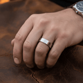 BRAWLER - Lifestyle photo on hand - men's tungsten wedding ring.
