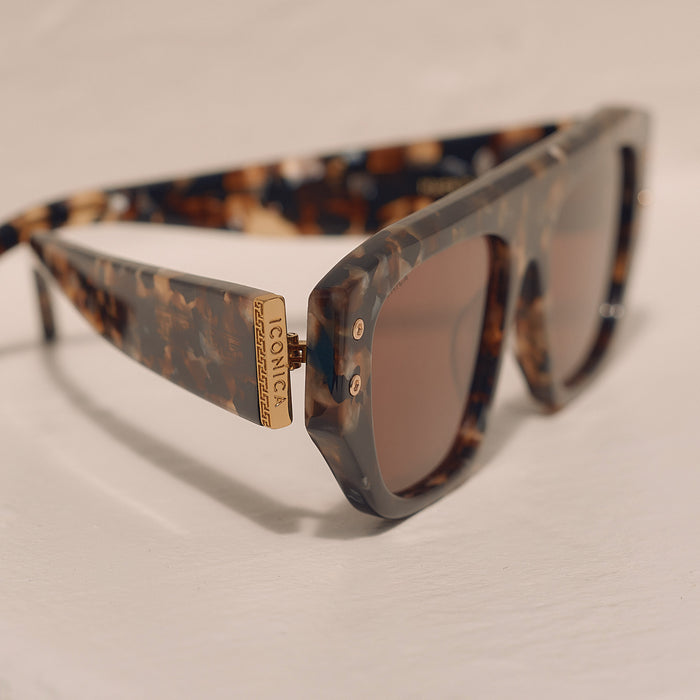 still life - iconica the calla rectangle sunglasses with a tortoise frame and brown polarized lenses detailed temple view