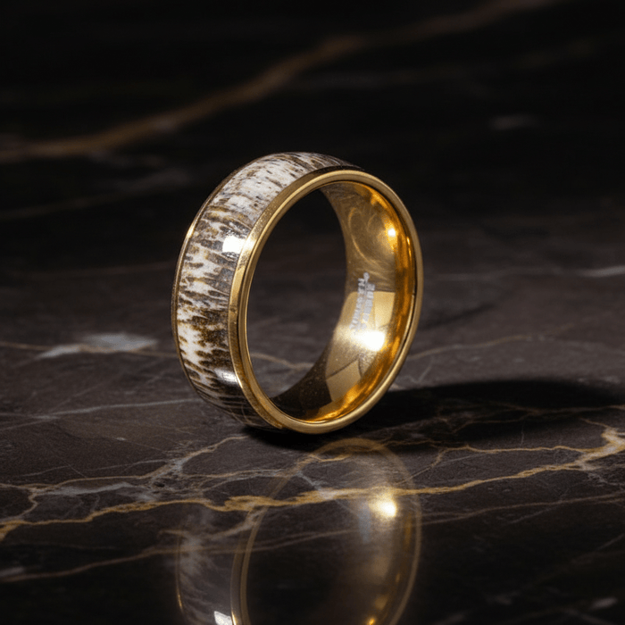 COLUMBA — Luxury 3/4 angle on dark marble — men's tungsten wedding ring.