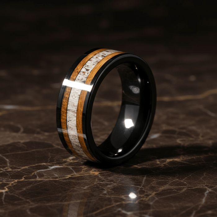 DEERWOOD — Luxury 3/4 angle on dark marble — men's tungsten wedding ring.