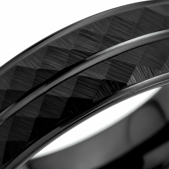 DEIMOS — Extreme macro detail — men's tungsten wedding ring.