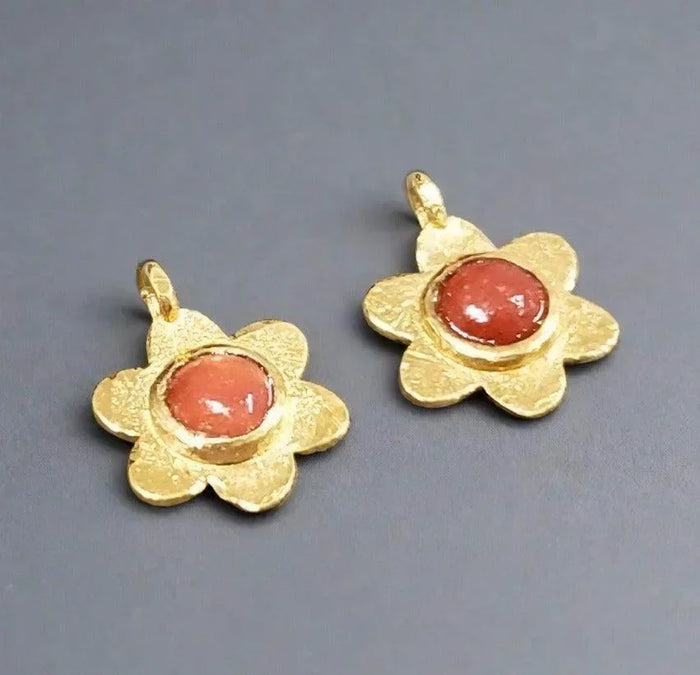 Gold flower pendants with coral center stones, elegant jewelry accessories