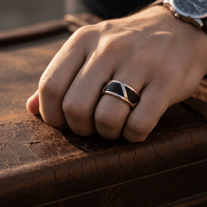 HILVEN — Lifestyle photo on hand — men's tungsten wedding ring.