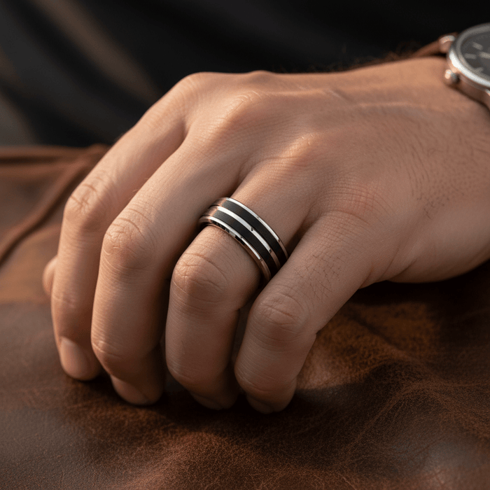 LEOPARD — Lifestyle photo on hand — men's tungsten wedding ring.