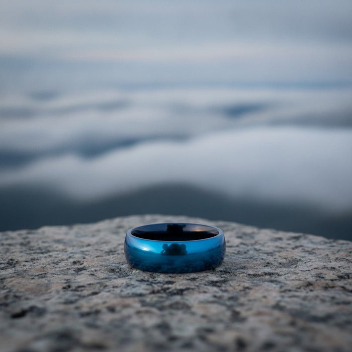 Aydins LIGHTNING | Blue Tungsten Carbide Wedding Ring with Domed Profile - 8mm lifestyle scene, granite overlook