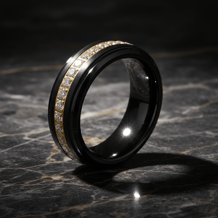 LUSTRE — Luxury 3/4 angle on dark marble — men's tungsten wedding ring.
