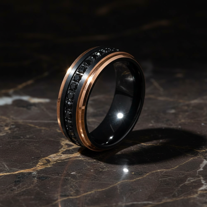 PASSINO black tungsten with rose gold edges black CZ eternity ring luxury 3/4 standing on dark marble