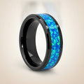 QUANTUM black ceramic wedding band with blue and green opal inlay running around the band and polished beveled edges, studio hero shot