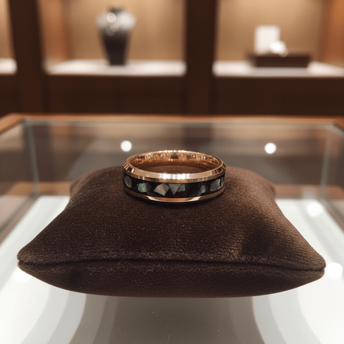 RESINOVA — Premium boutique display on velvet — men's tungsten wedding ring.