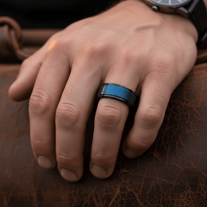 ROCKET — Lifestyle photo on hand — men's tungsten wedding ring.