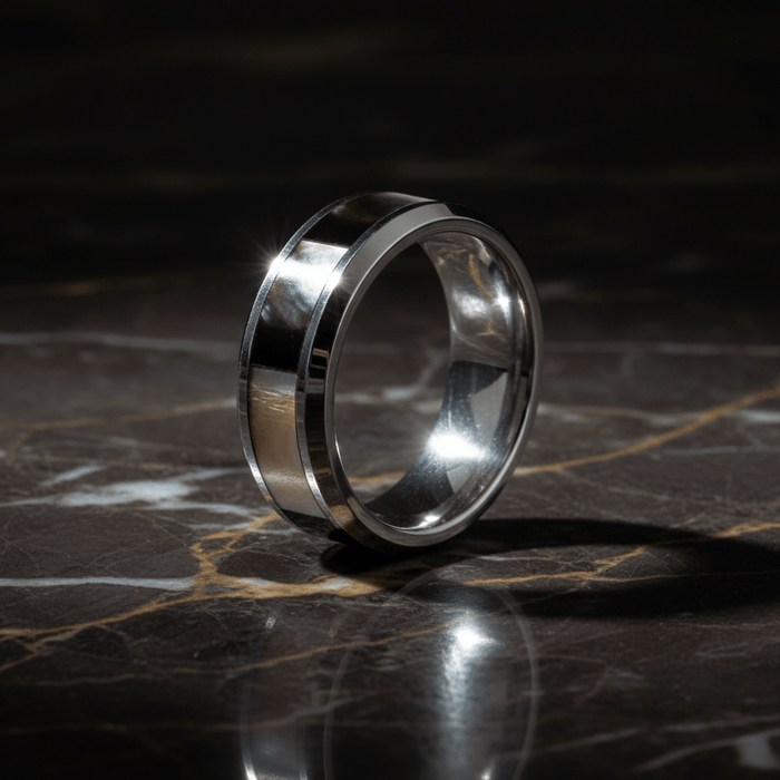 SCORPIO — Luxury 3/4 angle on dark marble — men's tungsten wedding ring.