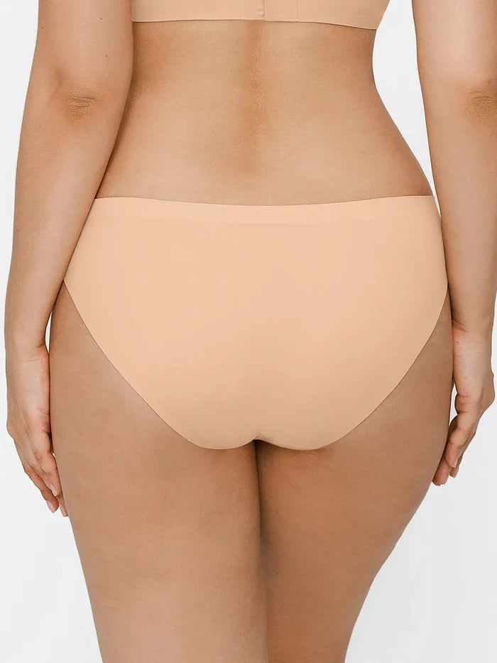 Seamless high-stretch bikini in skin tone, featuring a flattering bikini cut and comfortable waistband.