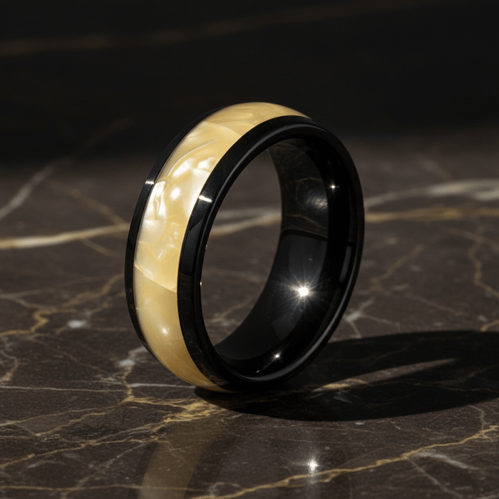 SOLSTICE — Luxury 3/4 angle on dark marble — men's tungsten wedding ring.