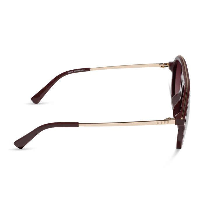 diff eyewear featuring the tosca iii aviator sunglasses with a rugby red acetate and gold accent frame and burgundy gradient polarized lenses side view