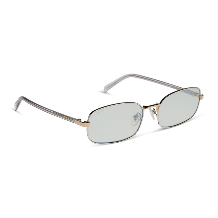 rachael kirkconnell x diff eyewear naomi square sunglasses with a trinity silver and gold metal frame and silver lenses angled view