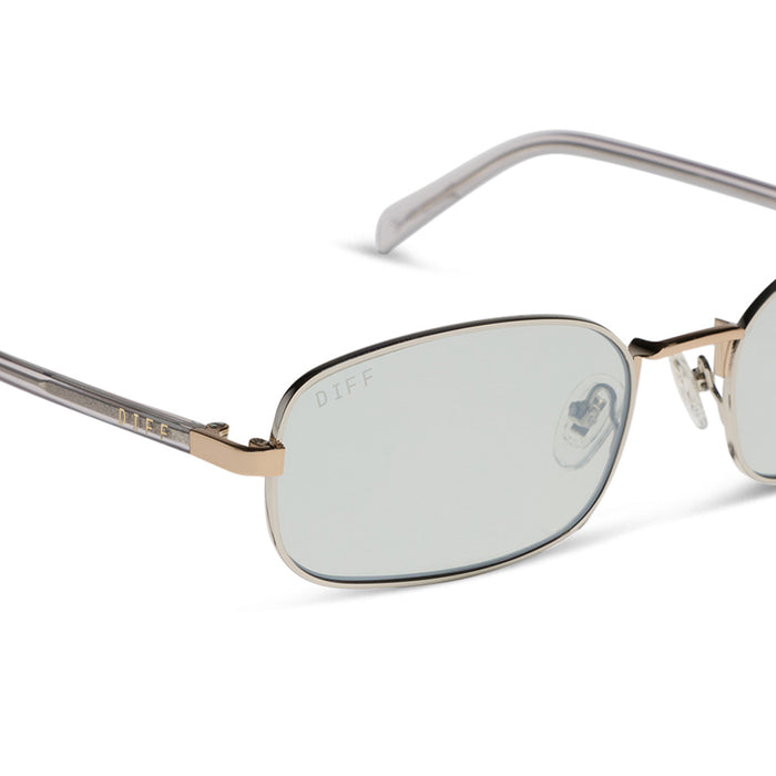 rachael kirkconnell x diff eyewear naomi square sunglasses with a trinity silver and gold metal frame and silver lenses detailed view