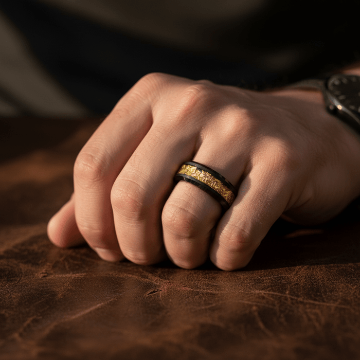 ZORYN — Lifestyle photo on hand — men's tungsten wedding ring.